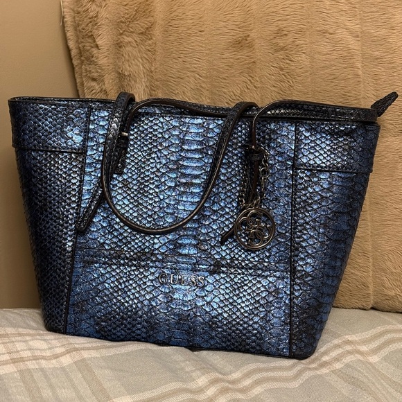 Guess Handbags - GUESS Metallic Blue Snake-Embossed Tote with Charm